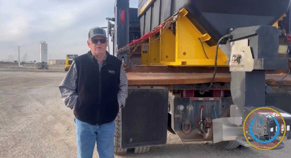 Commissioner Dan DeLozier Black vest and blue flannel